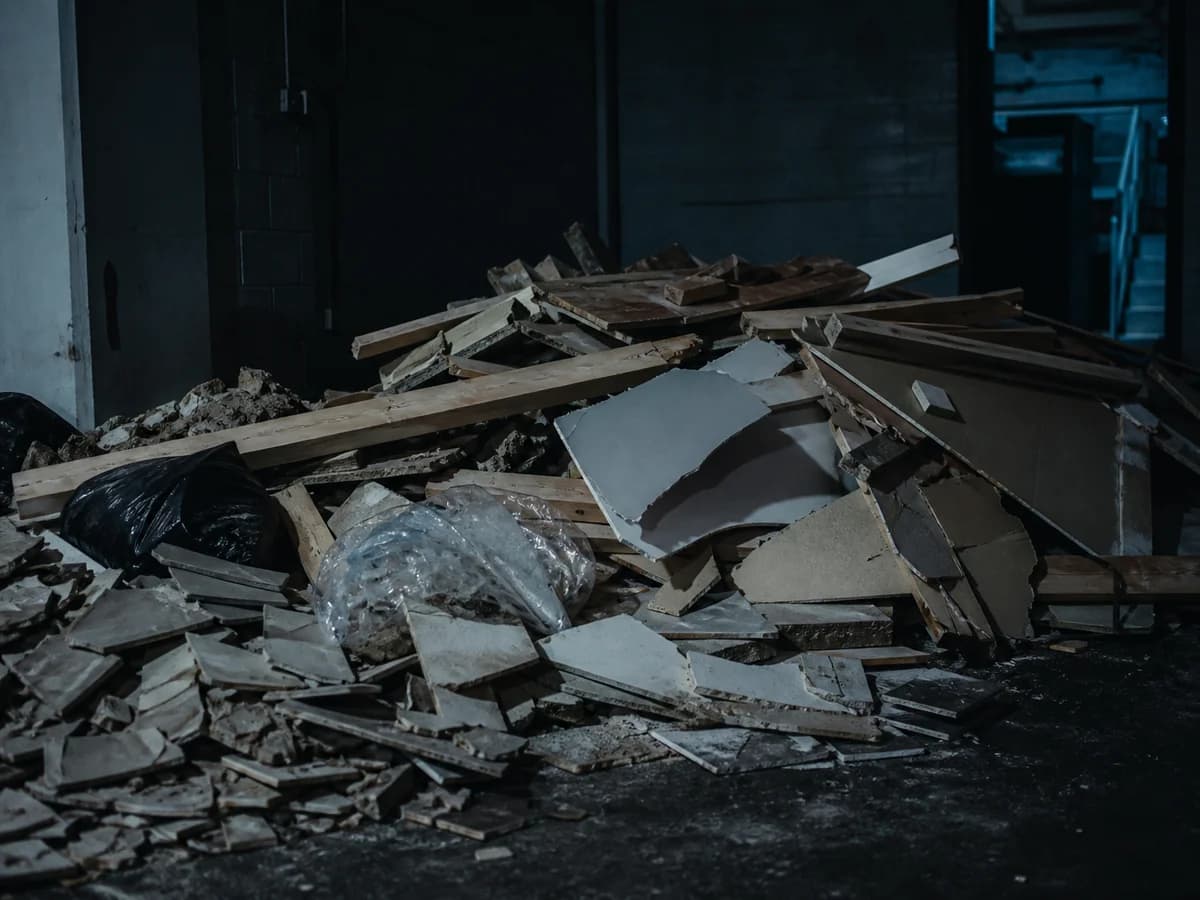 Junk Command loading construction debris after a home renovation